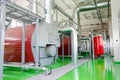 The interior of a modern industrial gas boiler room. Pipelines, water pumps, valves, manometers. Royalty Free Stock Photo