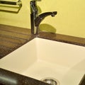 Interior of modern kitchen and ceramic sink and tap Royalty Free Stock Photo