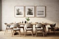 The interior of a modern kitchen and living room with a dining table and frames on the wall Royalty Free Stock Photo