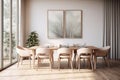 The interior of a modern kitchen and living room with a dining table and frames on the wall Royalty Free Stock Photo