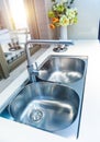 Interior of modern kitchen with stanless steel sink Royalty Free Stock Photo