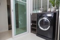 Interior of modern kitchen with washing machine. Royalty Free Stock Photo