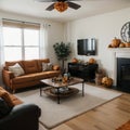 Interior of modern living room with comfortable sofa chair table and pumpkins Royalty Free Stock Photo