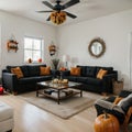 Interior of modern living room with comfortable sofa chair table and pumpkins Royalty Free Stock Photo