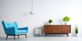 Interior of modern living room with sideboard over white wall. Contemporary room with dresser and blue armchair. Home design