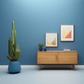 Interior of modern living room with wooden commode, cactus and pictures on blue wall Royalty Free Stock Photo