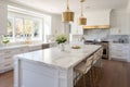 Interior of modern luxurious kitchen classic style. White cabinets with gilded handles, kitchen island with white marble Royalty Free Stock Photo