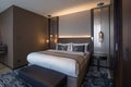 Interior of a modern luxury hotel bedroom Royalty Free Stock Photo