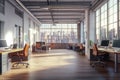 The interior of a modern office has computer tables in a row, panoramic windows, and rows of computers Royalty Free Stock Photo