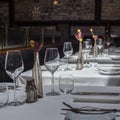 Interior of a modern restaurant with tables served for dinner Royalty Free Stock Photo