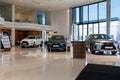 Minsk, Belarus - Nov 25, 2021: interior of a modern stylish dealership with new Lexus luxury SUVs