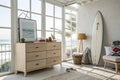 Interior of modern stylish room with chest of drawers and surfboard Royalty Free Stock Photo