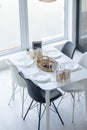 Interior of modern sunny kitchen in a Scandinavian-style apartment. Royalty Free Stock Photo