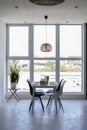 Interior of modern sunny kitchen in a Scandinavian-style apartment. Royalty Free Stock Photo