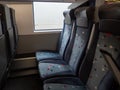 The interior of a modern train.Passenger train at the station. Passenger transportation. Chairs on the train. Train before Royalty Free Stock Photo