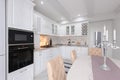 Modern white wooden kitchen interior Royalty Free Stock Photo