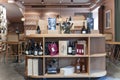 Interior of modern wine boutique store with vintage style wooden showcases