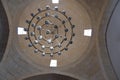 Low angle view of dome inside the mosque and ancient style chandelier