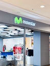 Movistar store interior showcasing modern design, technology products, and customer service area in a vibrant shopping mall Royalty Free Stock Photo