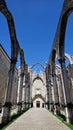 Interior of Museu Arqueologico do Carmo, ruin of Gothic Church of Our Lady of Mount Carmel or Carmo Convent, under a Royalty Free Stock Photo