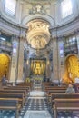 interior of the nave of the Santa Maria dei Miracoli church with the front altar in the Italian city of Rome.