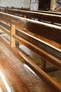 Interior of Notre Dame de La garde Cathedral, rows of pews, sunlight, selective focus, vertical frame, France, Marseille Royalty Free Stock Photo