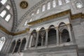 Interior of Nuruosmaniye Mosque showing the Niche Mihrab, marble wall and stained glass windows Royalty Free Stock Photo