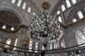 Interior of Nuruosmaniye Mosque showing the Niche Mihrab, marble wall and stained glass windows Royalty Free Stock Photo