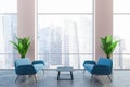 Pink office lounge area, blue sofas Royalty Free Stock Photo