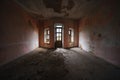 Interior of an old abandoned rooms, a lot of garbage, old furniture and antiquities destroyed, rooms need repair, old dust and