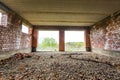 Interior of an old building under construction. Orange brick walls in a new house. Royalty Free Stock Photo