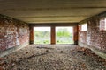 Interior of an old building under construction. Orange brick walls in a new house. Royalty Free Stock Photo