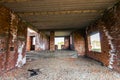 Interior of an old building under construction. Orange brick walls in a new house. Royalty Free Stock Photo