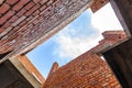 Interior of an old building under construction. Orange brick walls in a new house. Royalty Free Stock Photo