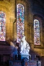 Interior of old catholic church in France, Europe. Statue