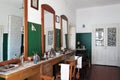 Interior of old eastern european hairdressing salon in a provincial town in Poland at early 20th century