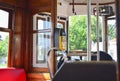 Interior of a old famous yellow elevator tram 28 Royalty Free Stock Photo