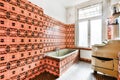 Bathroom with bright tiles in old apartment Royalty Free Stock Photo