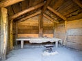 Interior of an old hut with a gable roof Royalty Free Stock Photo