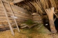 Interior of an old log barn Royalty Free Stock Photo