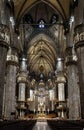 Interior of old Milan Cathedral or Duomo di Milano. It is great Catholic church, top landmark of Milan. Inside the dark Gothic