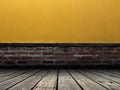 Interior of old red brick wall and yellow grunge cement wall with wooden flooring, Empty room template for display product. Royalty Free Stock Photo