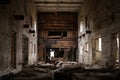 Interior of the old ruined abandoned barn for cows. Destroyed agriculture Royalty Free Stock Photo