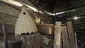 Interior of an old rustic wooden barn with a hive of wild bees, basket Royalty Free Stock Photo