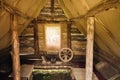 Interior in an old small wooden hut Royalty Free Stock Photo