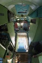 Interior of an old transport aircraft, airstairs pilots seats, equipment