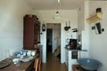 Interior of old typical eastern european kitchen in a provincial town in Poland at early 20th century with charcoal burner and