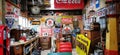 An interior of an old vintage workshop filled with transportation style memorabilia