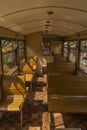Interior of old wooden coach on narrow gauge railway in Balnica station