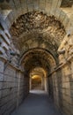 Interior of one of the entrances to the stands and stage of the ancient Roman Theater of Merida, with a vaulted ceiling of stones Royalty Free Stock Photo